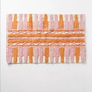 Anthropologie-FLATWOVEN BEYA BATH MAT IN PINK